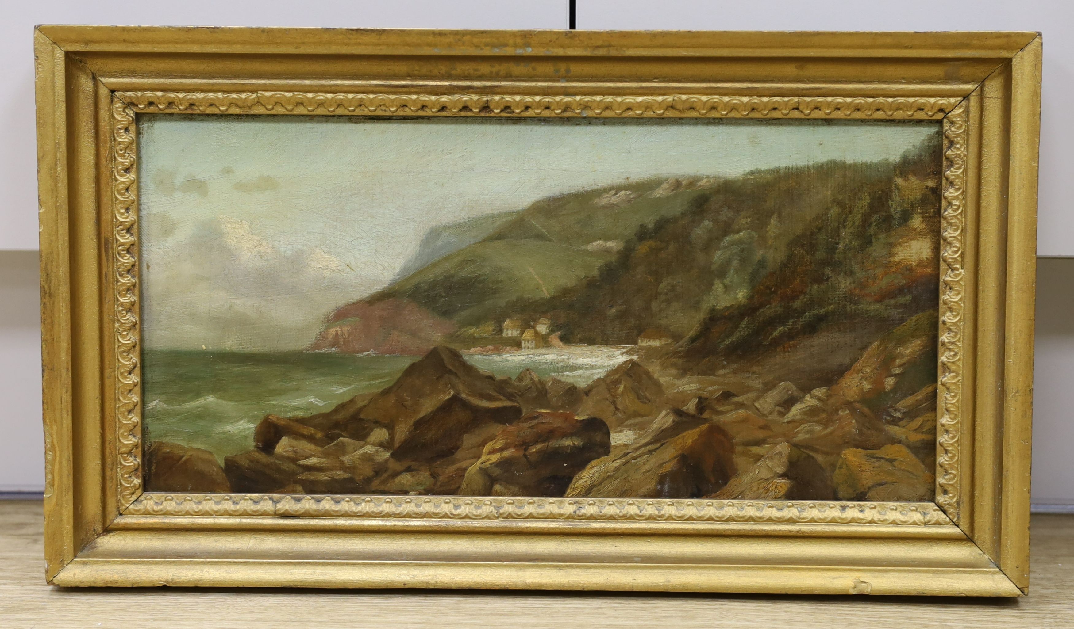 English School c.1900, oil on canvas, Coastal landscape, 19 x 39cm